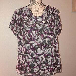 Tag came off of this one. I think it’s Calvin Klein. But can’t be sure.